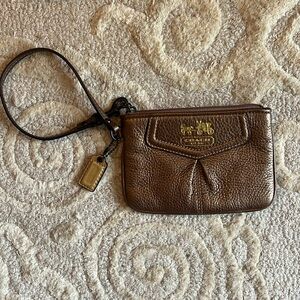 Bronze coach leather wristlet